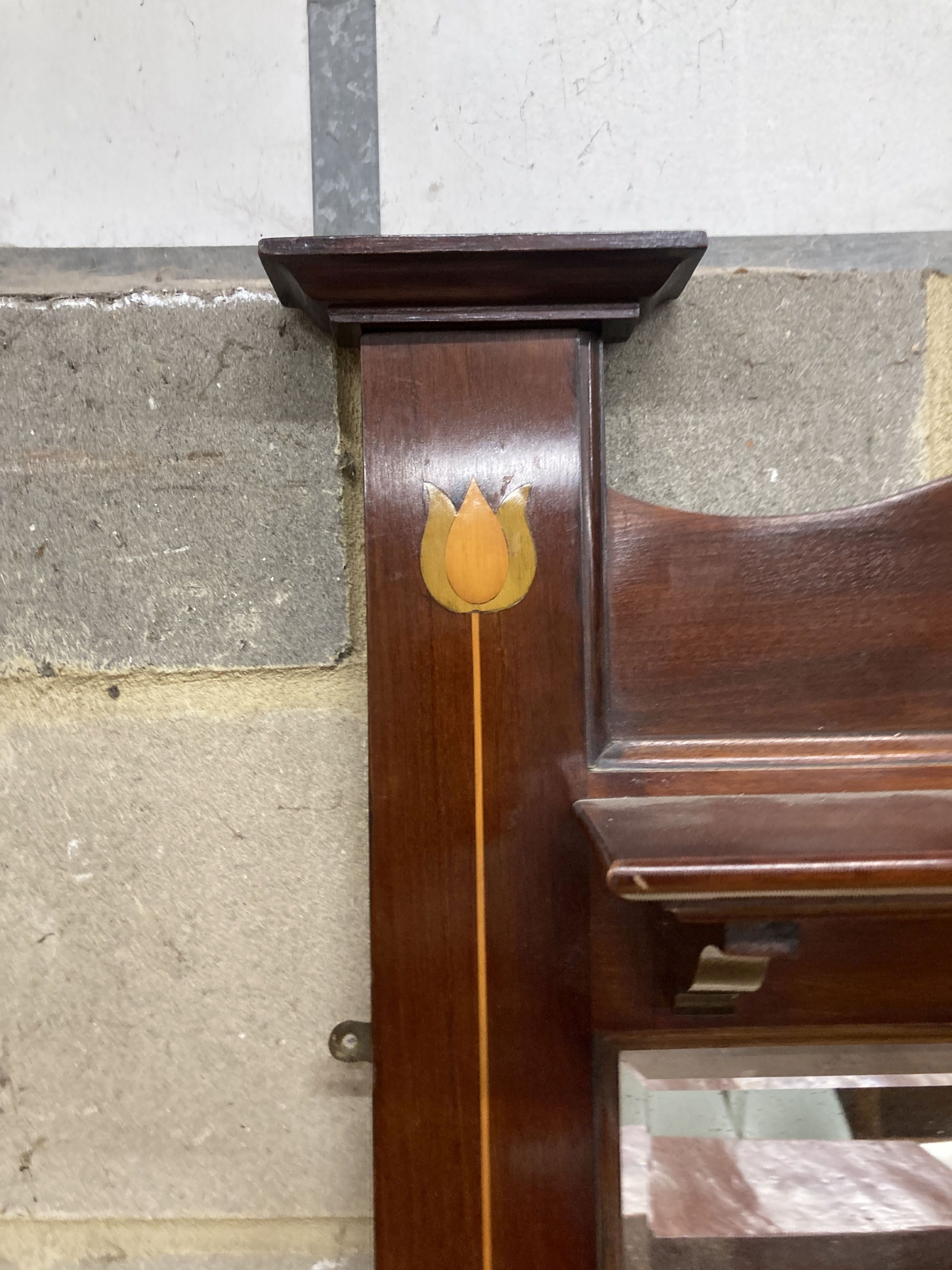 A late Victorian Art Nouveau inlaid mahogany overmantel mirror, width 122cm, height 86cm